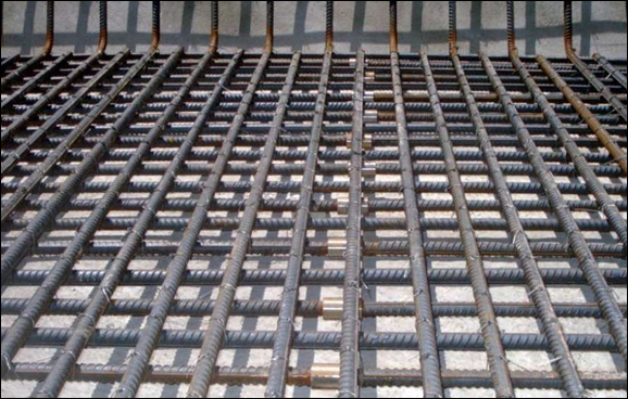 Steel mesh grid system for concrete buildings