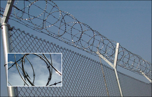 Hot Dipped Galvanised concertina barbed tape coils with cross razor blade wire supported by y post for high security fencing
